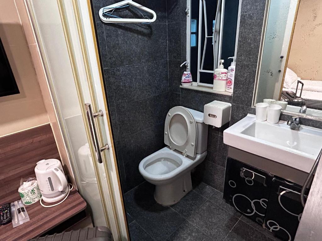 Koupelna v ubytování 香港星星旅馆 2202 Guesthouse