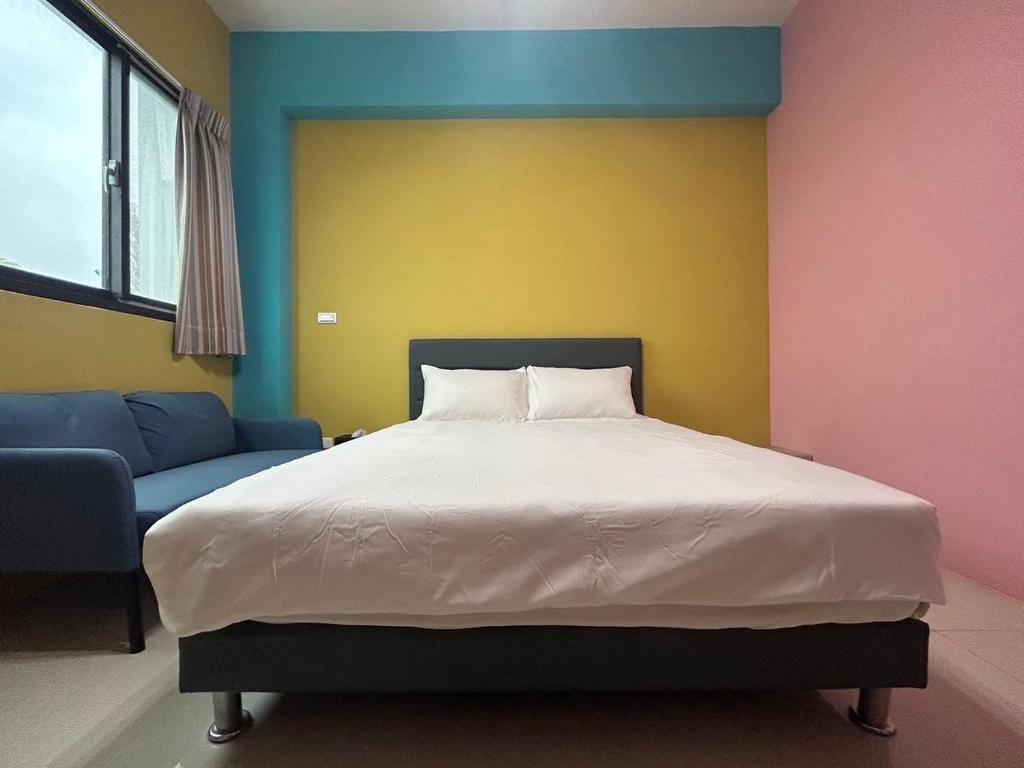 Postel nebo postele na pokoji v ubytování Anco Homestay