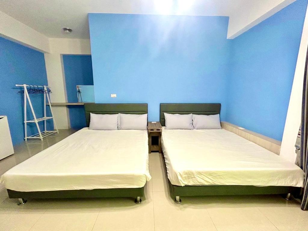 Postel nebo postele na pokoji v ubytování Anco Homestay
