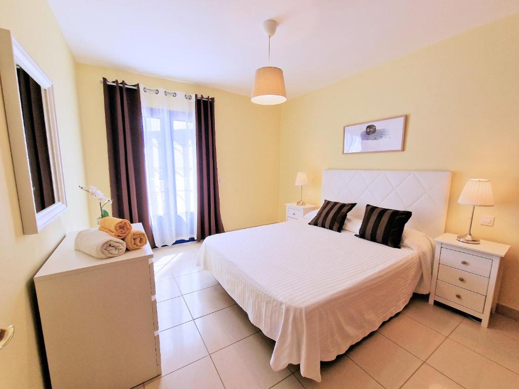 Postel nebo postele na pokoji v ubytování Aloe Vera Beach, Dúplex 1ª Línea de Mar