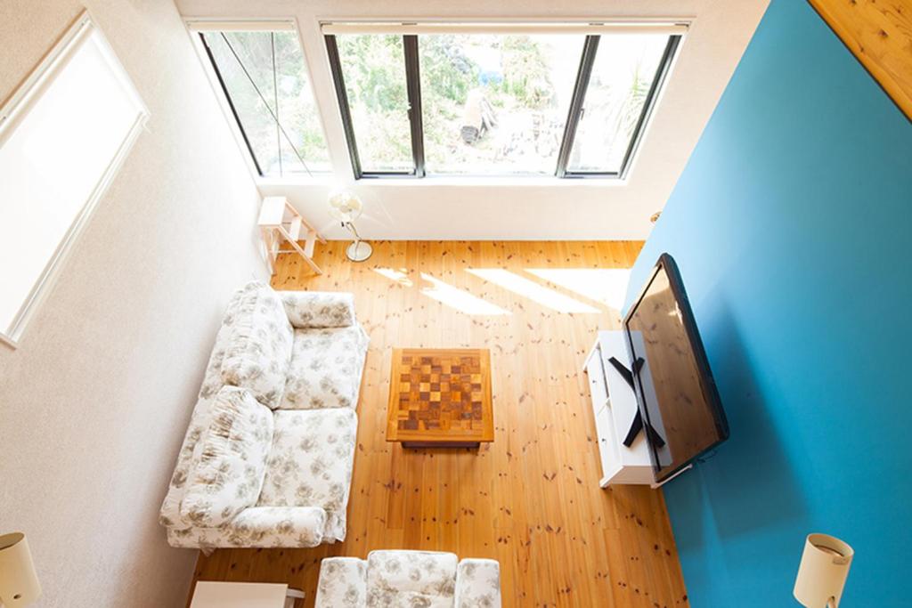 TV a/nebo společenská místnost v ubytování Minami Hayama Seaside Cabin -南葉山シーサイドキャビン-
