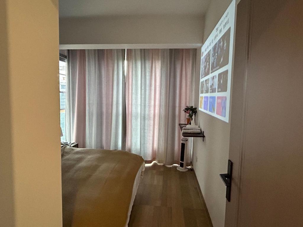 TV a/nebo společenská místnost v ubytování Annie 公寓-2602