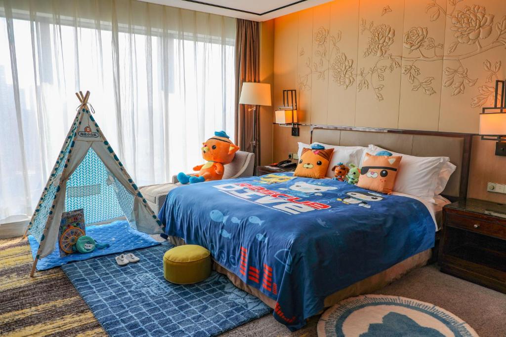 Postel nebo postele na pokoji v ubytování InterContinental Fuzhou