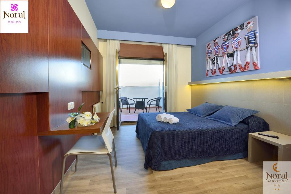 Postel nebo postele na pokoji v ubytování Nuevo Norat Sanxenxo