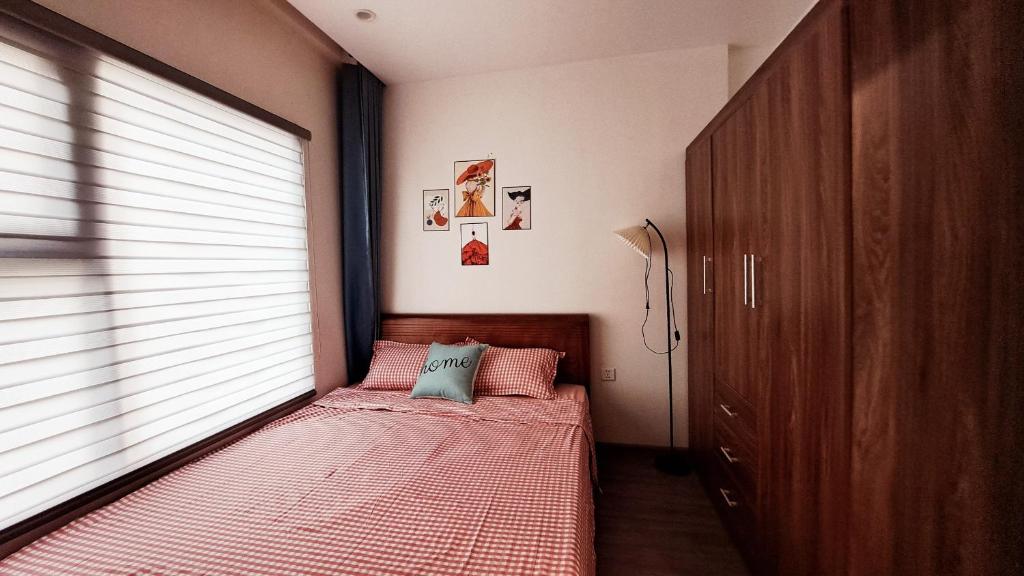 Ένα ή περισσότερα κρεβάτια σε δωμάτιο στο Apartment near Technopark Building and VinUni