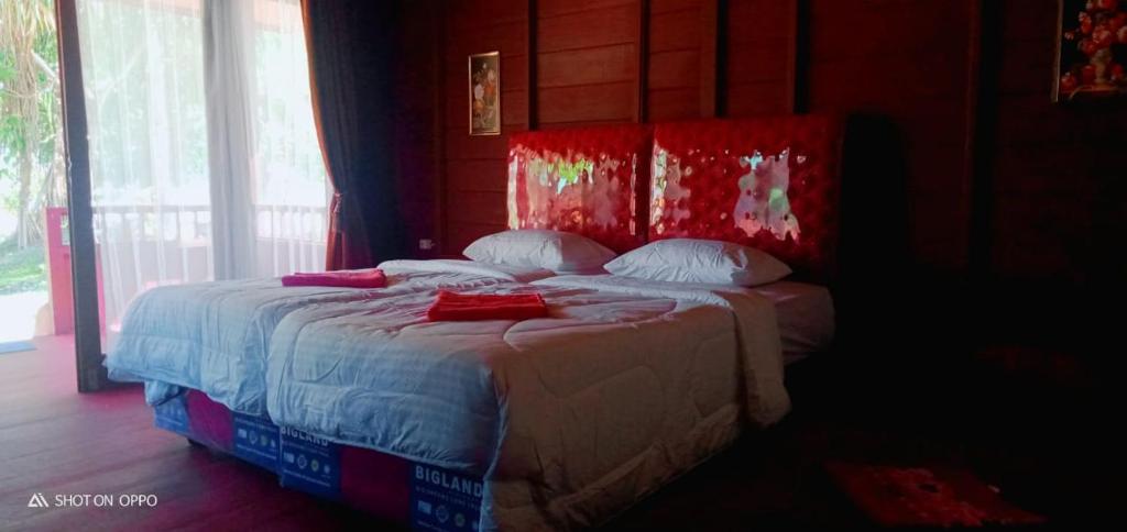 Postel nebo postele na pokoji v ubytování Raflow Resort Raja Ampat