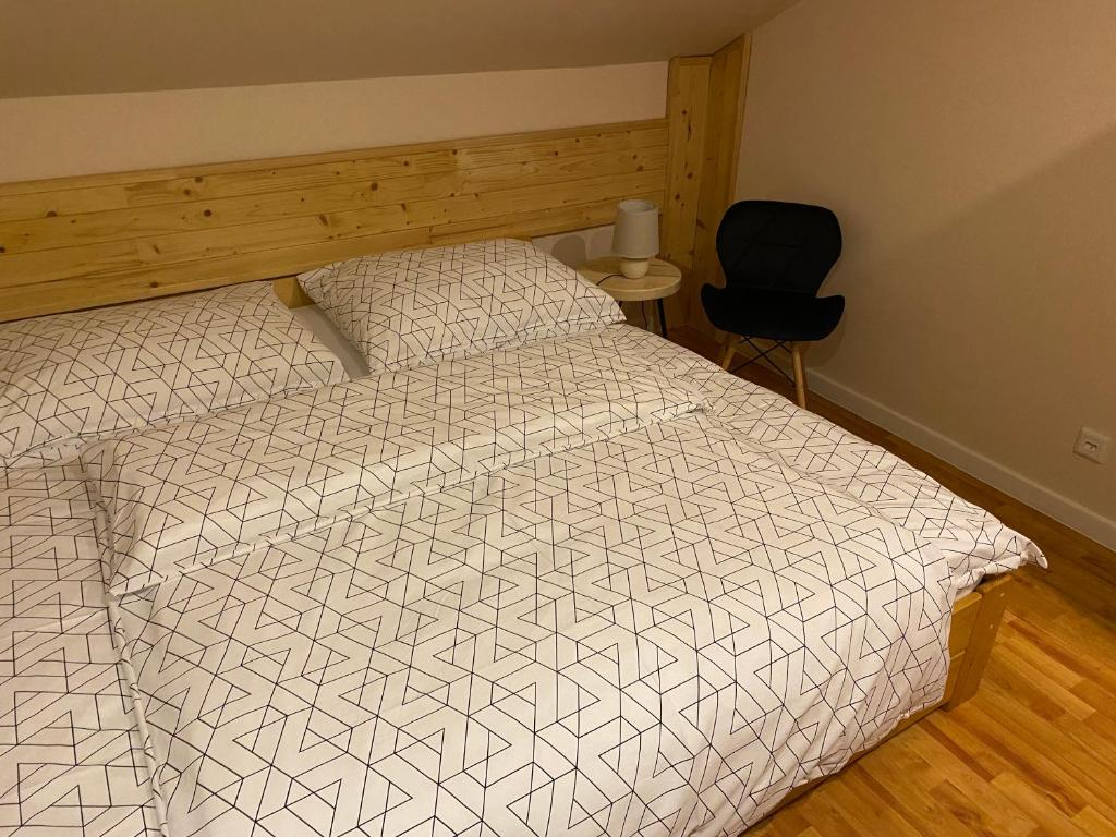 Posteľ alebo postele v izbe v ubytovaní Domcek v strani