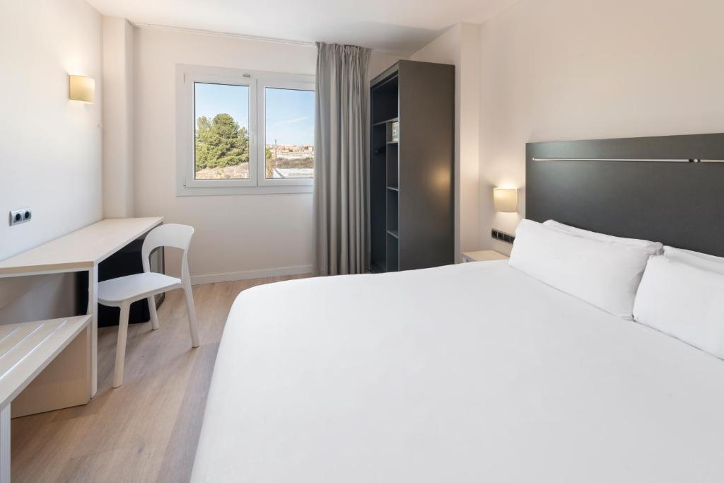 Postel nebo postele na pokoji v ubytování B&B HOTEL Barcelona Rubí