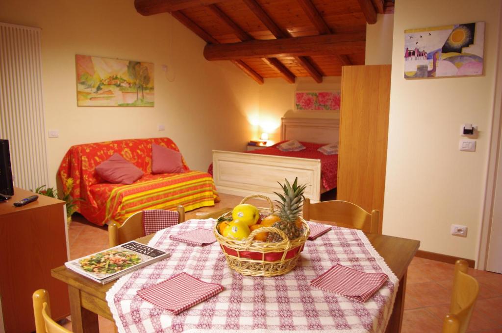 Postel nebo postele na pokoji v ubytování Agriturismo La Casa Del Mandorlo