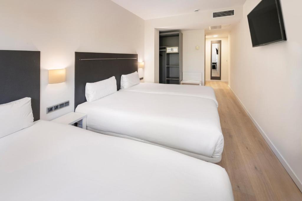 Postel nebo postele na pokoji v ubytování B&B HOTEL Barcelona Rubí