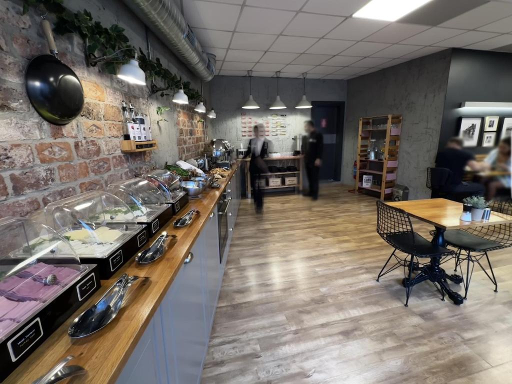 Kuchyň nebo kuchyňský kout v ubytování My Dora Hotel