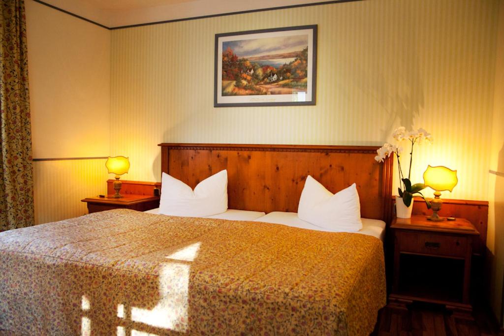 Postel nebo postele na pokoji v ubytování Landgasthof & Hotel Jagdhof