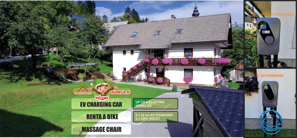 a large white house with signs in front of it at Apartments Lake Bohinj Medja in Bohinj