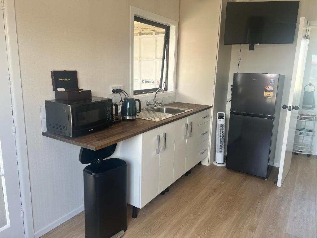 Kuchyň nebo kuchyňský kout v ubytování Windsor Motel