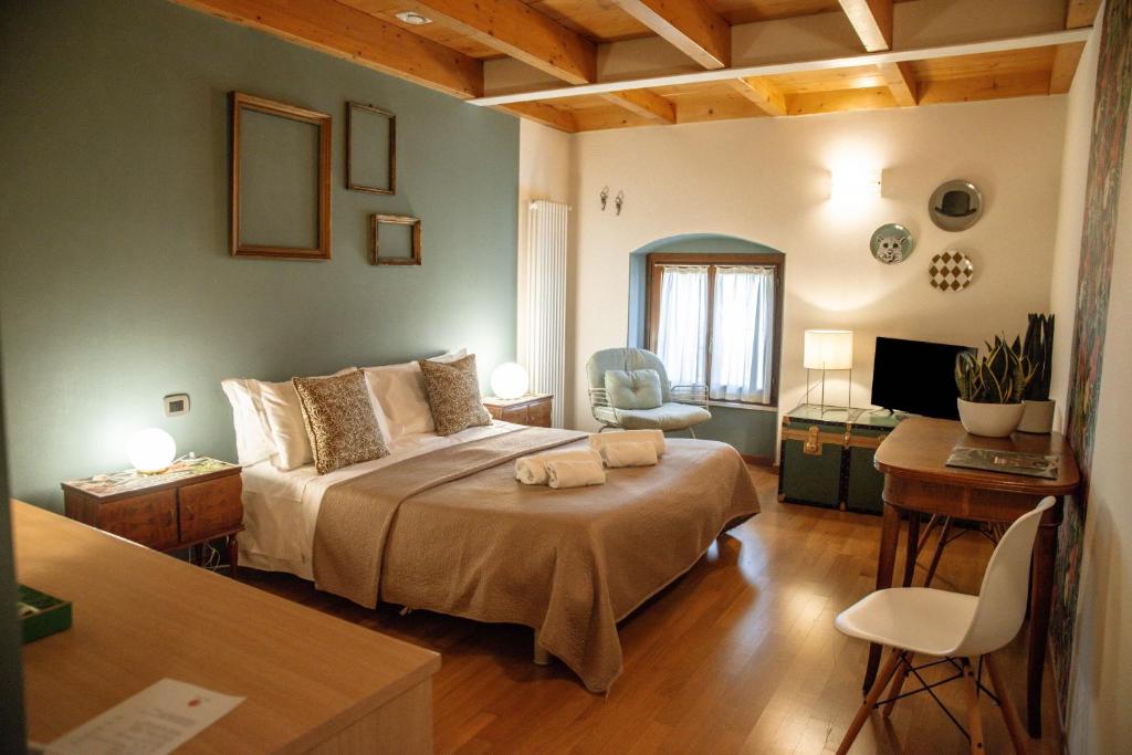Postel nebo postele na pokoji v ubytování Pietra di Verona Residenza