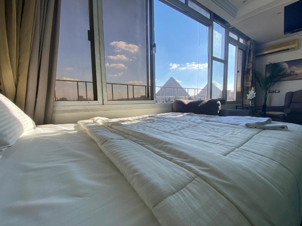 Postel nebo postele na pokoji v ubytování House pyramids View