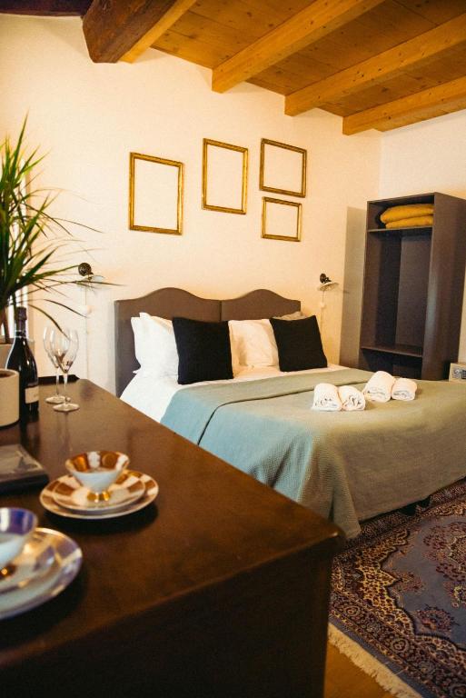Postel nebo postele na pokoji v ubytování Pietra di Verona Residenza