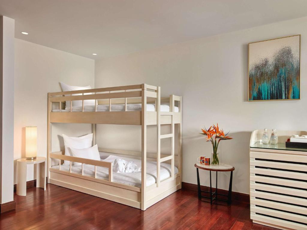 Postel nebo postele na pokoji v ubytování Pullman Danang Beach Resort