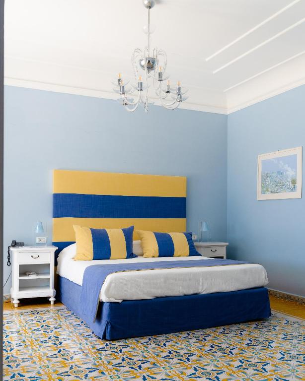 Postel nebo postele na pokoji v ubytování Villa Eliana
