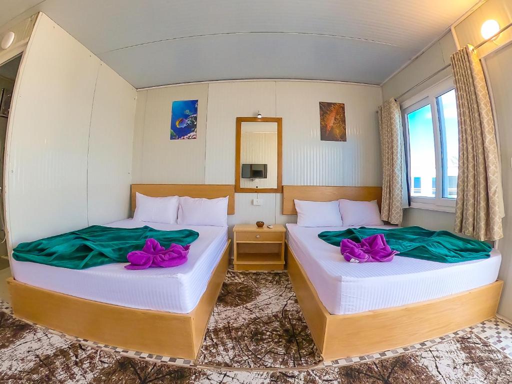 Postel nebo postele na pokoji v ubytování Seaview Hotel Dahab