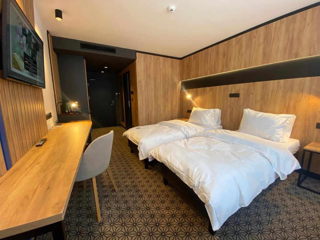 En eller flere senger på et rom på Best Western Hotel Vista