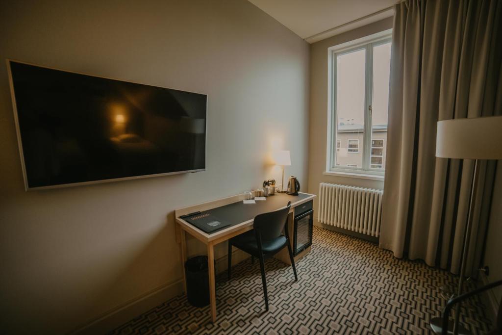 TV a/nebo společenská místnost v ubytování Coop Hotell