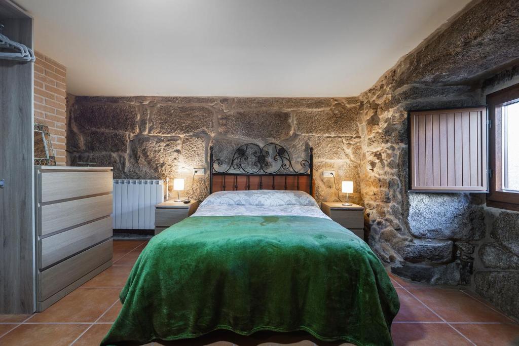 Postel nebo postele na pokoji v ubytování Villa Vaquiña