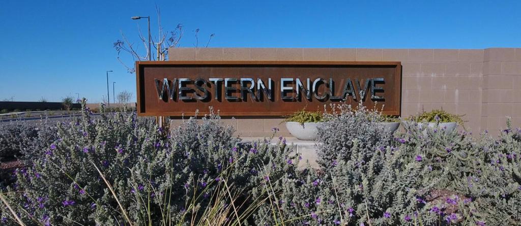 a sign for the western exchange in front of a building at AT YOUR SERVICE - Modern Amenities, Urban Location, Sophisticated Style in Phoenix