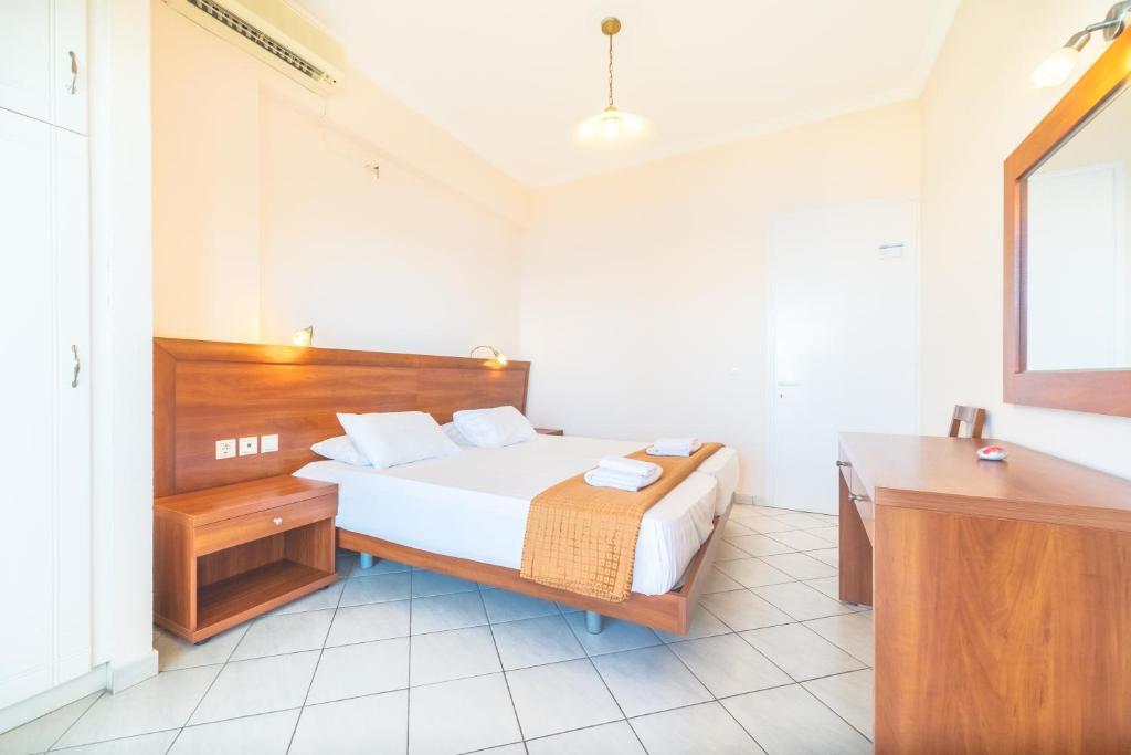 Ein Bett oder Betten in einem Zimmer der Unterkunft Lido Sofia Apartments