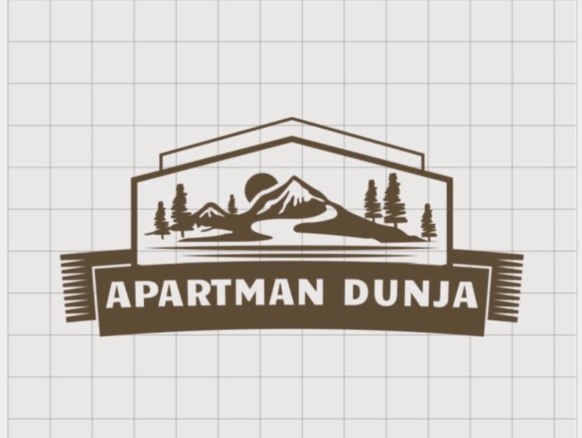 um logótipo para um manequim patiriano com uma montanha em Apartman Dunja em Divčibare
