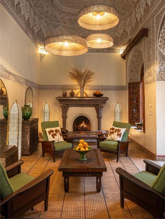 Posezení v ubytování La Villa des Orangers - Relais & Châteaux