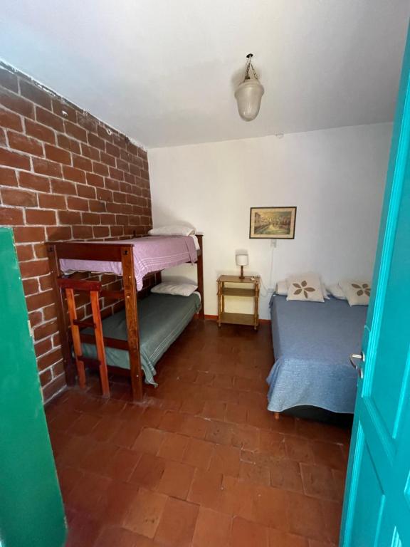 Postel nebo postele na pokoji v ubytování A la Gurda Hostel