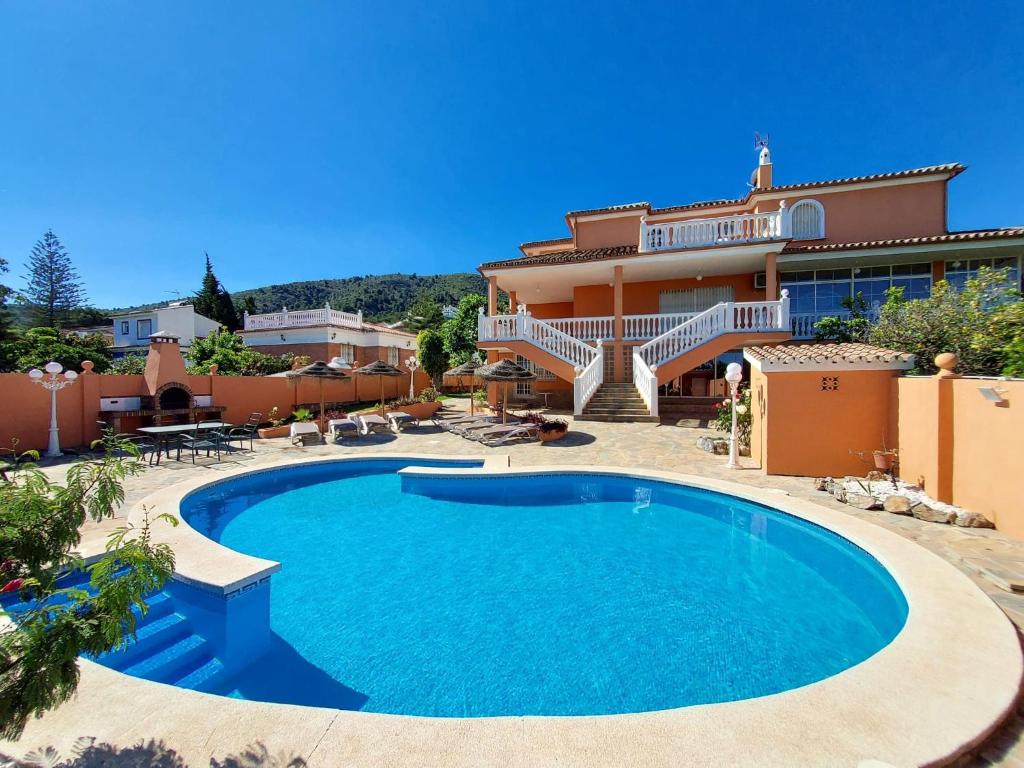 Bazén v ubytování TESS Villa Paradise nebo v jeho okolí