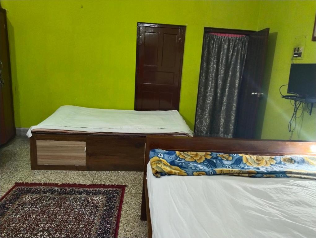 Postel nebo postele na pokoji v ubytování Aleyahome stay