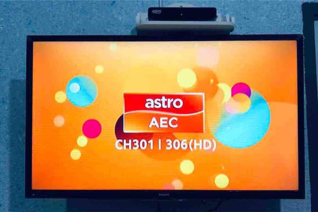 TV a/nebo společenská místnost v ubytování Kota Kinabalu Four Seasons Homestay 沙巴亚庇四季小屋