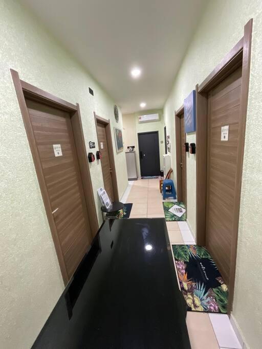 TV a/nebo společenská místnost v ubytování Kota Kinabalu Four Seasons Homestay 沙巴亚庇四季小屋