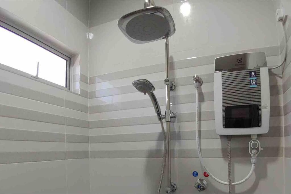 Koupelna v ubytování Kota Kinabalu Four Seasons Homestay 沙巴亚庇四季小屋