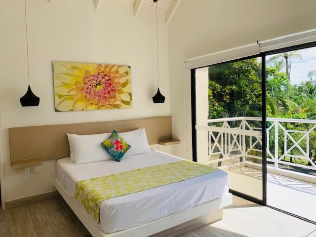 Casa de las Flores tropical客房内的一张或多张床位