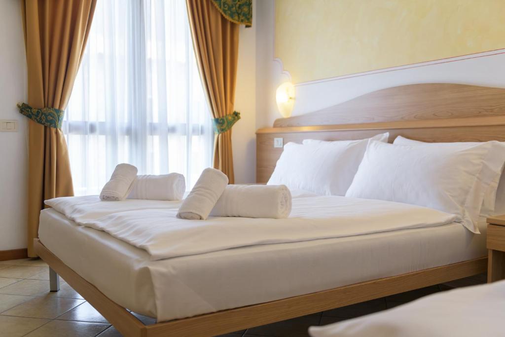 Postel nebo postele na pokoji v ubytování Hotel Antico Monastero