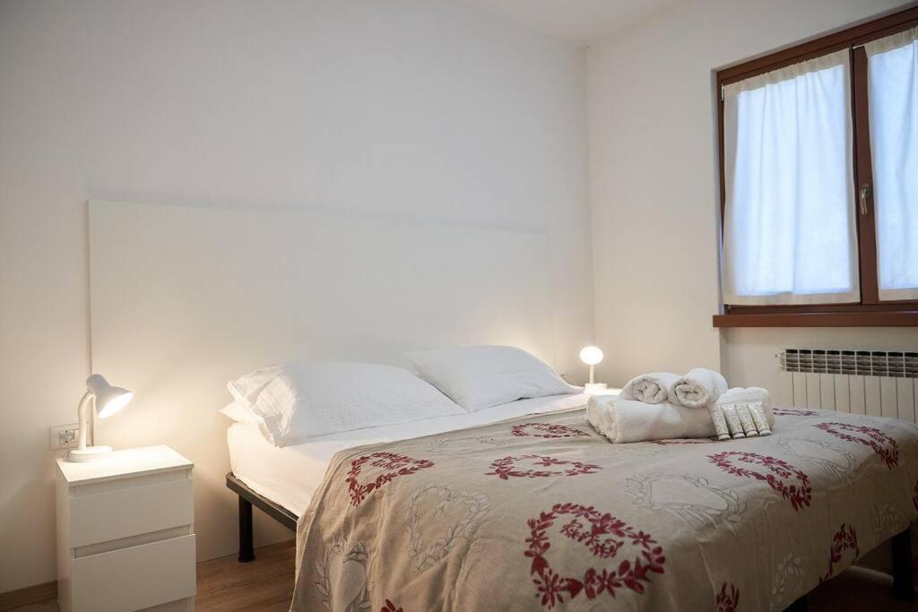 Postel nebo postele na pokoji v ubytování Appartamento a Caderzone Terme