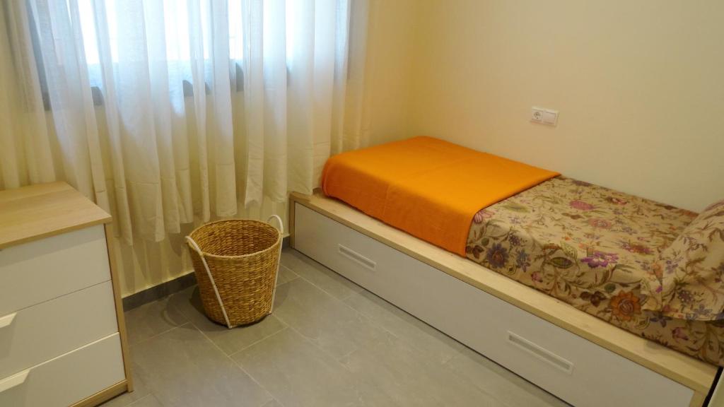 Postel nebo postele na pokoji v ubytování Apartamento zona playa de San Sebastian