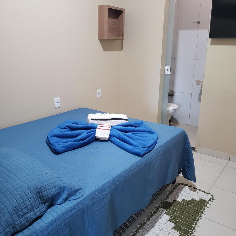 Postel nebo postele na pokoji v ubytování Pousada RP4 dos lençóis