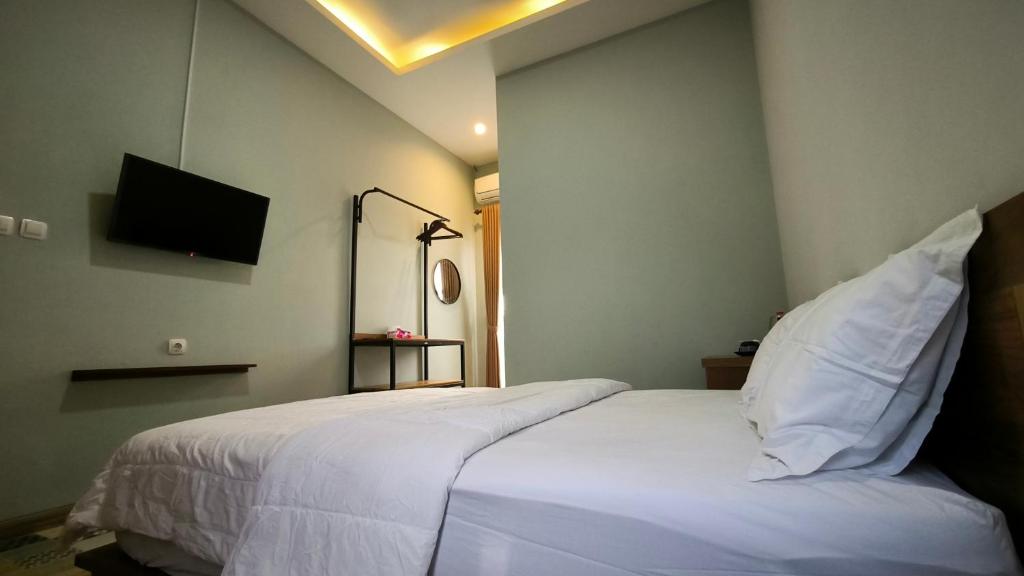Nez's Guesthouse Syariah - Luxe Tweepersoonskamer