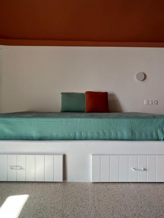 Postel nebo postele na pokoji v ubytování IANUA Casa per Viaggiatori