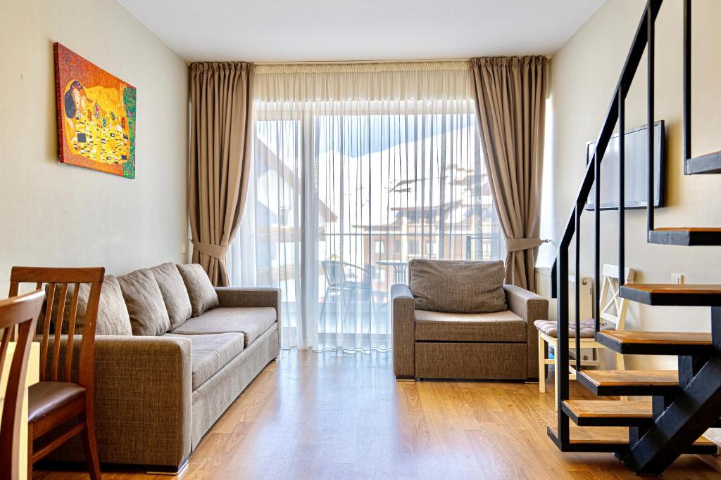 Posezení v ubytování 3-room Apartment NFT New Gudauri 404