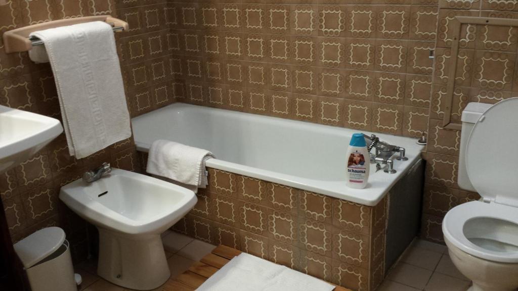 Baðherbergi á Friendly Auberge