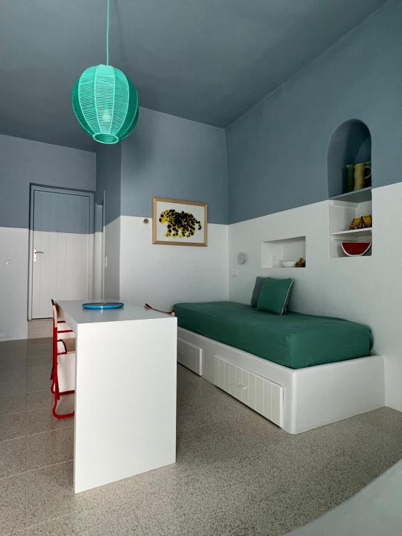 Postel nebo postele na pokoji v ubytování IANUA Casa per Viaggiatori