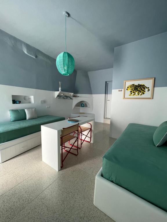 Postel nebo postele na pokoji v ubytování IANUA Casa per Viaggiatori