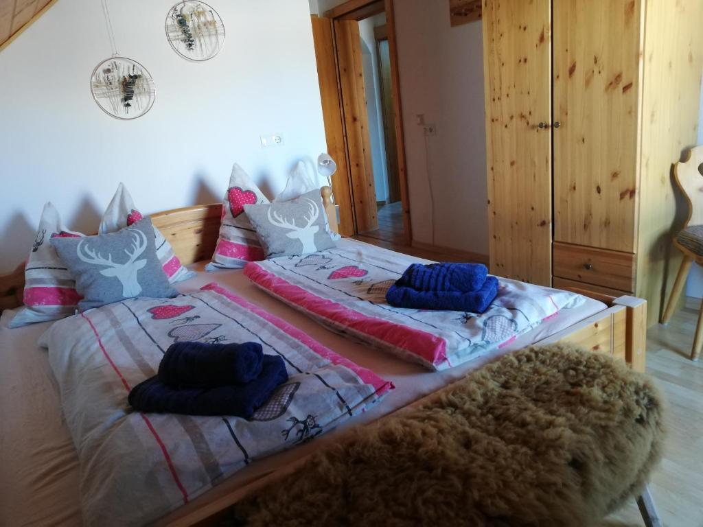 Postel nebo postele na pokoji v ubytování Panoramahof Gupf