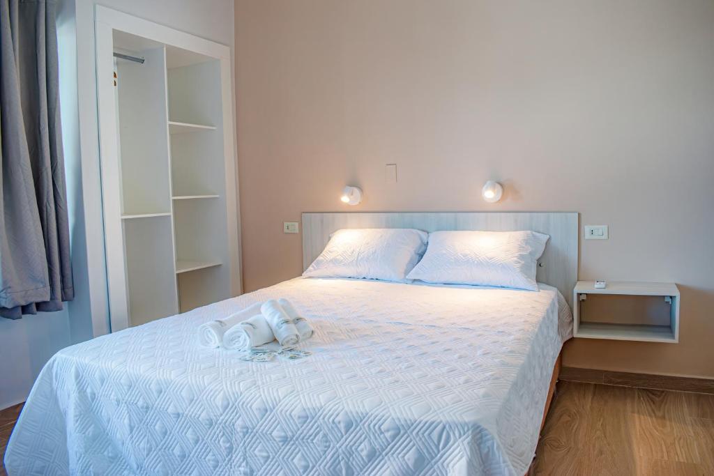 Postel nebo postele na pokoji v ubytování Hotel Rio Dorado